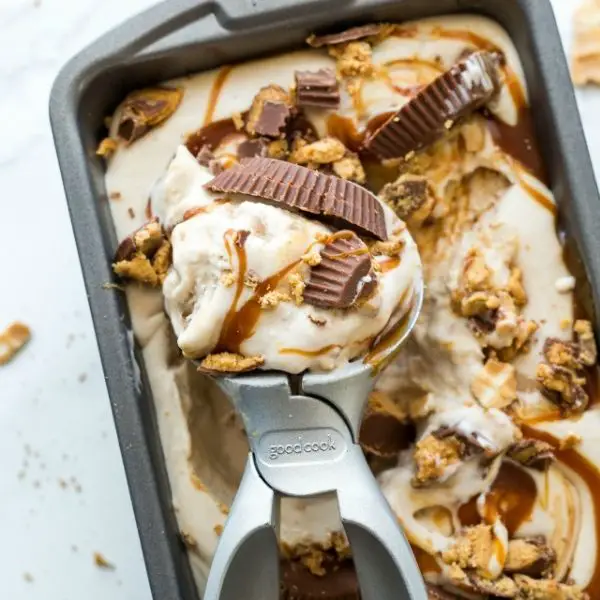banana peanut butter cup ice cream in pan with scoop