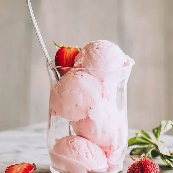 strawberry ice cream in glass cup