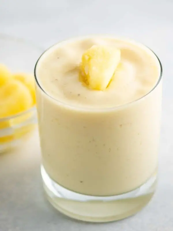 frosty pineapple smoothie in small glass
